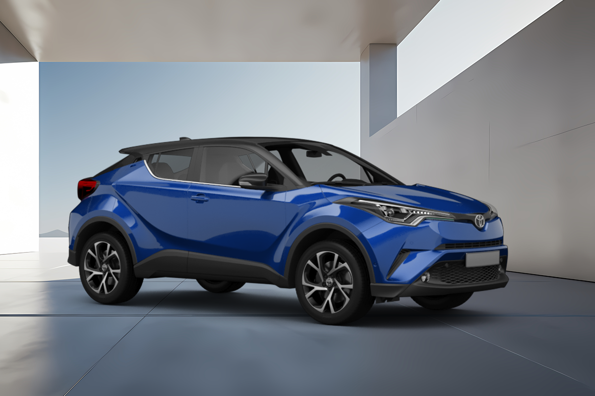 zu sehen ist ein blauer Toyota CHR vor Betonwand