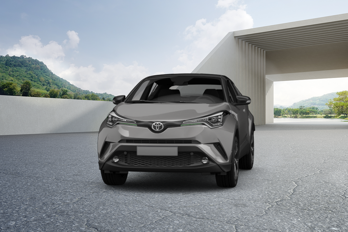 zu sehen ist ein grauer Toyota CHR vor Bergen und Bogen